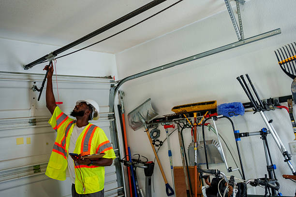Professional Garage Door Panel Replacement technician working in Oktibbeha County County, MS